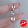 Collier coeur infini argent 925 porté au cou, Maison du Collier collection luxe