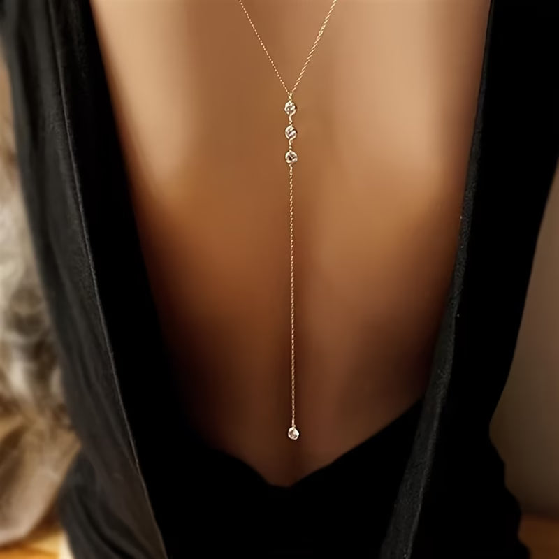 collier de dos nu femme 4 strass dore mariage soiree maison du collier