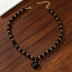 Collier obsidienne cœur noir et doré pour femme – Maison du Collier