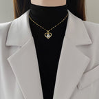Collier cœur femme porté — idée cadeau bijou doré Maison du Collier