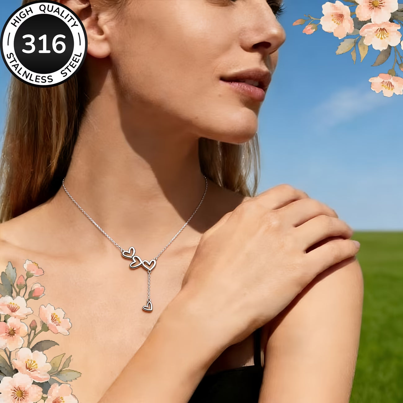 Collier trois cœurs pampille porté femme, détail des pendentifs cascade
