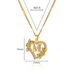 Collier initiale lettre dorée zircon — bijou personnalisé femme Maison du Collier
