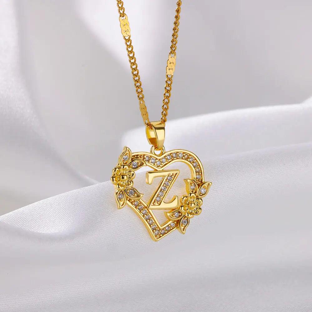 Collier avec une lettre acier inoxydable doré — Maison du Collier