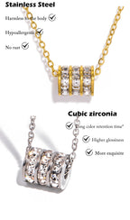 Collier cylindre doré détail chaîne — bijou femme tendance 2026