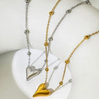 collier coeur femme pendentif chaine perlee porte maison du collier